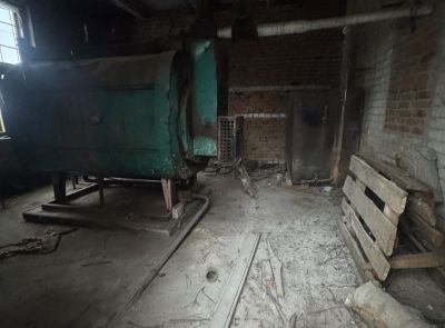 Здание многофункциональное юго-западнее д. Хойники, площадью 1006.4 кв.м.